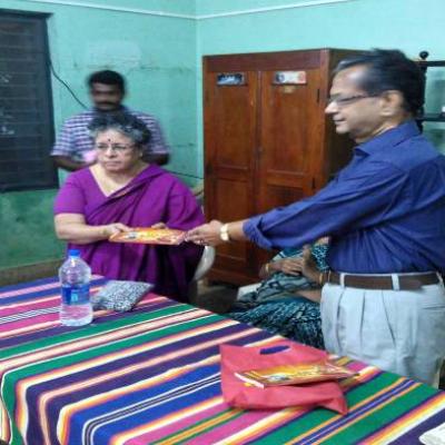 Dpf Published Book Presented To Trustee Of Madurai Guild Of Service Trusteesmt Indira