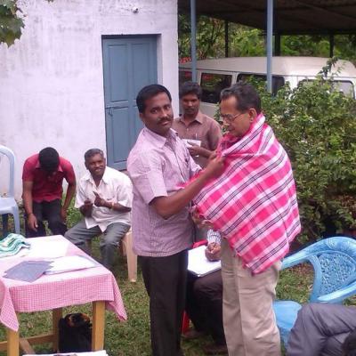 Hm Honouring Mr V.parthasarathy Dpf Managing Trustee With A Ponnadai