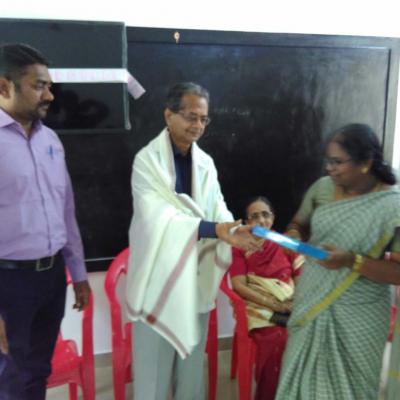 Hm Of School Felicitating Dpf Managing Trustee