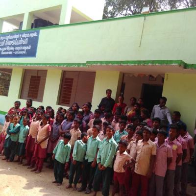 View Of The School With Students Lined Up